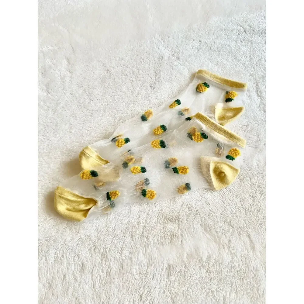 Yellow and green sheer pineapple socks ￼